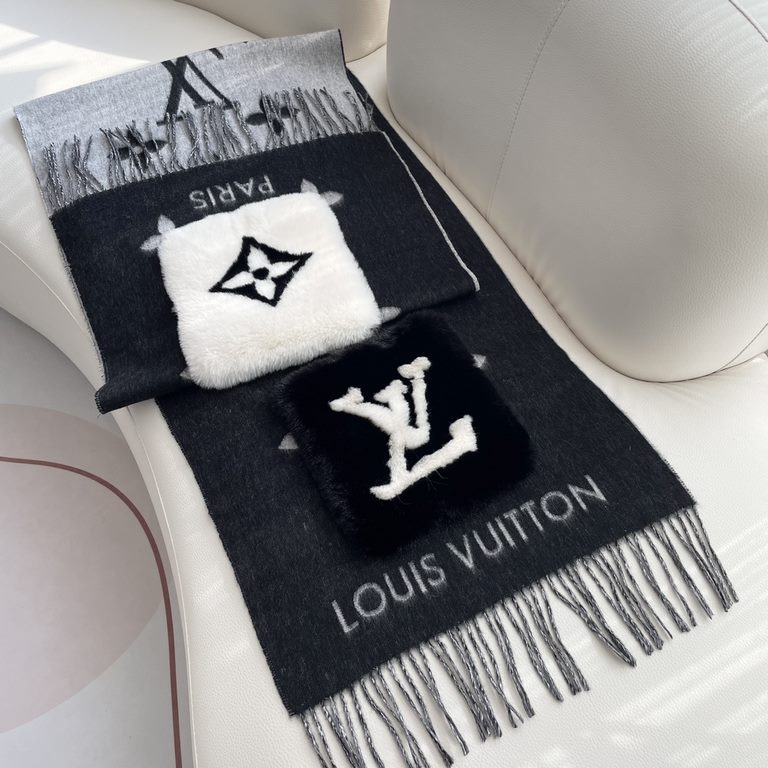 LV Pocket Cashmere Scarf   LV's new shawl scarf, a continuation of the winter classic   cashmere embellished with rabbit fur   pockets, inlaid with Monogram motifs for a more dignified look, with a long tassel in a large