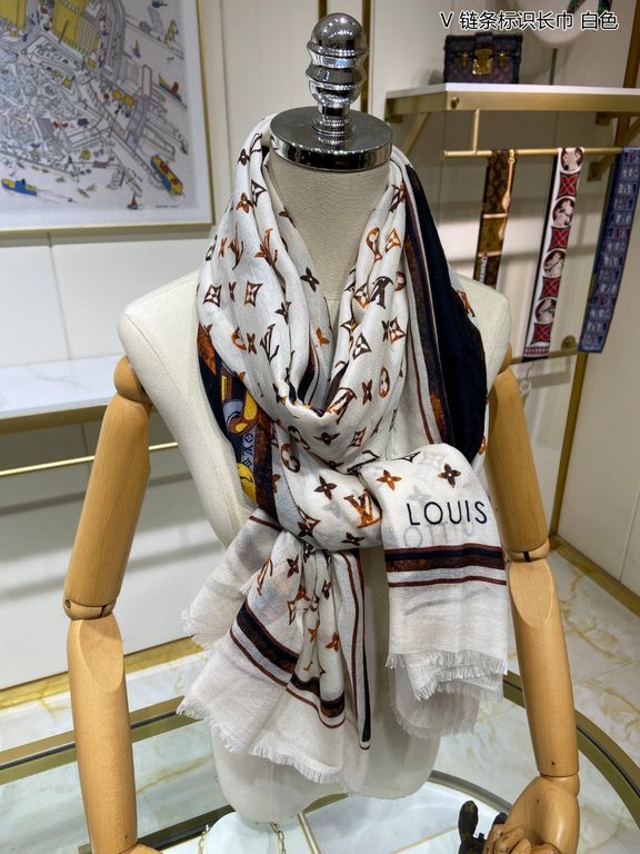 Price.   Donkey family new [V chain logo long scarf] cashmere long scarf, show LV letters in the classic Monogram pattern of dexterity changes, floral elements intertwined arrangement, embellished tassel trim. This size 