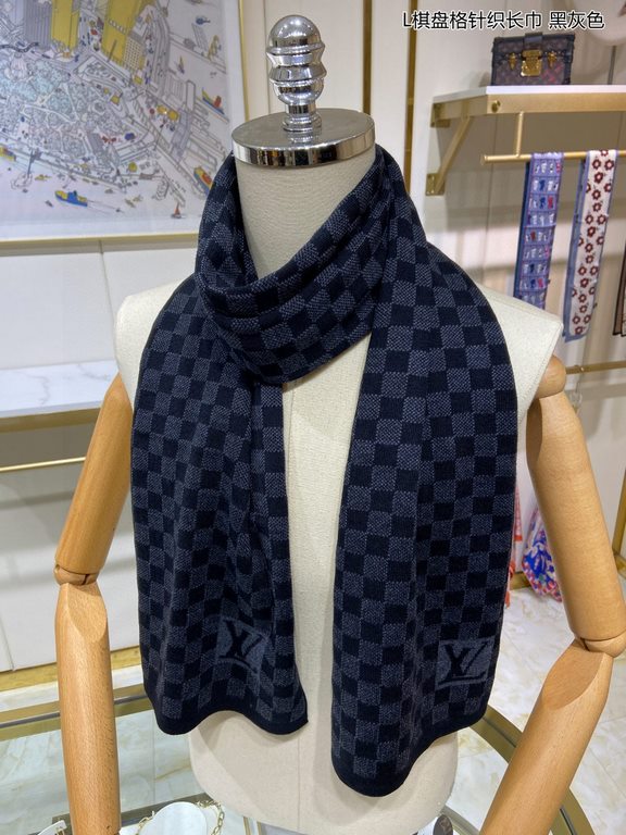 PriceCounter Sync   Donkey's new L Tessellated Knit Scarf features an eye-catching, classic Damier tessellated pattern with oversized LV letters and a rustic trim. The soft cashmere is a gorgeous texture. Highly recommen