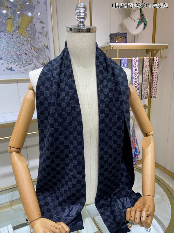 PriceCounter Sync   Donkey's new L Tessellated Knit Scarf features an eye-catching, classic Damier tessellated pattern with oversized LV letters and a rustic trim. The soft cashmere is a gorgeous texture. Highly recommen