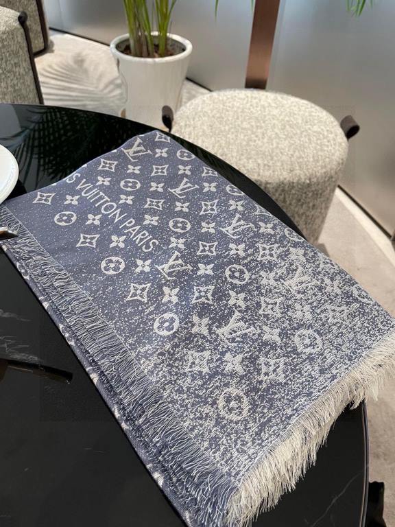 Pricelv2023's newest shawl has a gradient effect that resembles the chic texture of beloved jeans washed over time. The gorgeous silk-wool blend is cut to a generous size for a variety of styling possibilities. The      