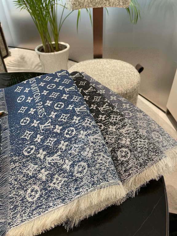 Pricelv2023's newest shawl has a gradient effect that resembles the chic texture of beloved jeans washed over time. The gorgeous silk-wool blend is cut to a generous size for a variety of styling possibilities. The      