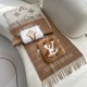 LV Pocket Cashmere Scarf   LV's new shawl scarf, a continuation of the winter classic   cashmere embellished with rabbit fur   pockets, inlaid with Monogram motifs for a more dignified look, with a long tassel in a large