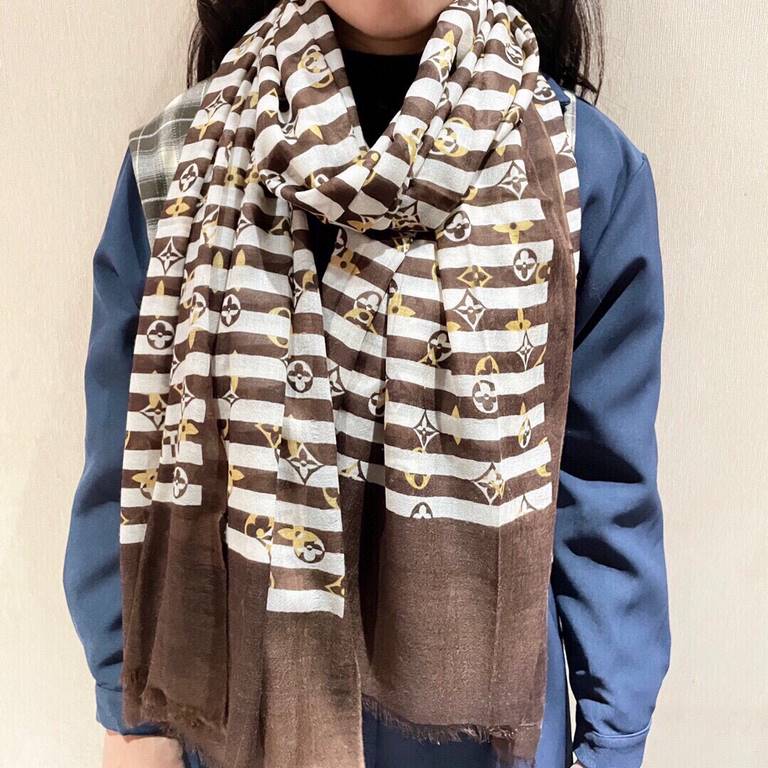 LV scarf truly awesome  original 11 customized   Miss LV long scarf taken from fine lightweight cashmere, eye-catching presentation of the Monogram pattern and tassel trim, but also the Louis Vuitton logo embellished bot