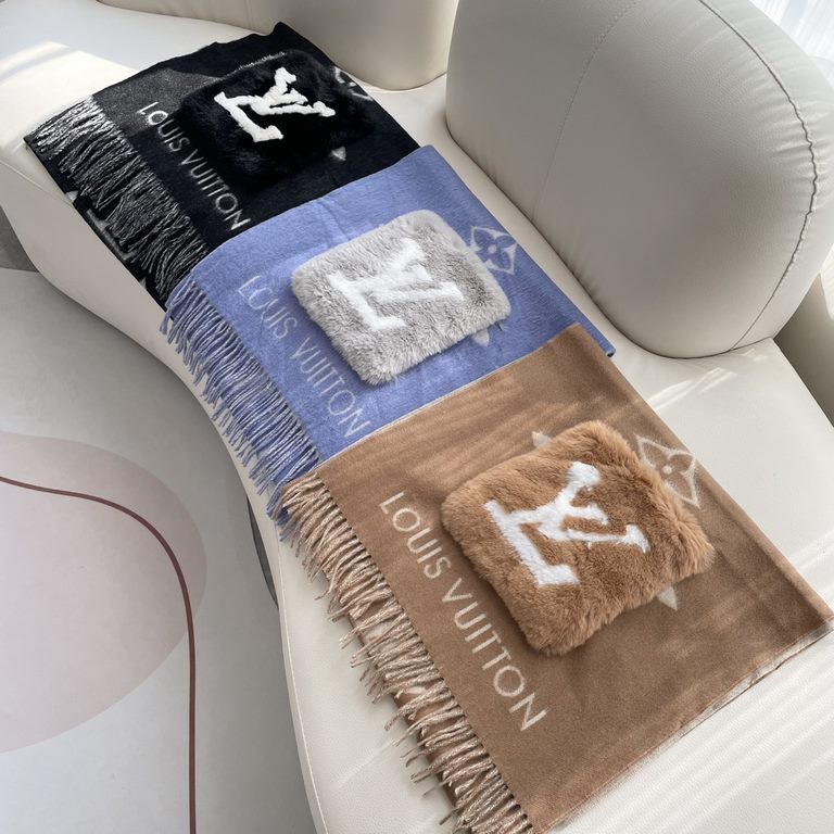 LV Pocket Cashmere Scarf   LV's new shawl scarf, a continuation of the winter classic   cashmere embellished with rabbit fur   pockets, inlaid with Monogram motifs for a more dignified look, with a long tassel in a large