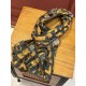 The new Lv print with the classic Monogram pattern and many of Louis Vuitton's signature design elements give this new scarf an enduring fashionable appeal. This scarf will add a touch of sophistication to a classic or t