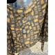 The new Lv print with the classic Monogram pattern and many of Louis Vuitton's signature design elements give this new scarf an enduring fashionable appeal. This scarf will add a touch of sophistication to a classic or t