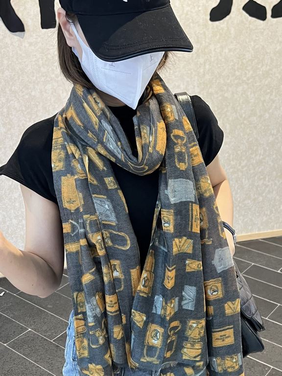 The new Lv print with the classic Monogram pattern and many of Louis Vuitton's signature design elements give this new scarf an enduring fashionable appeal. This scarf will add a touch of sophistication to a classic or t