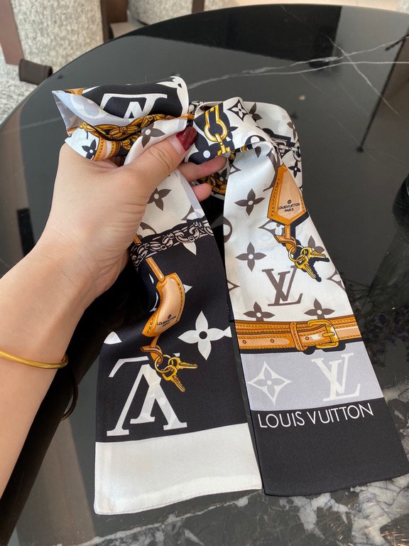 Super nice LV silk scarf! Double layered silk!Multi-purpose, tie it around your bag, use it as a hair tie or a small scarf, all very chic  !It also looks great with a simple bottom or a shirt around your neck!  100% silk