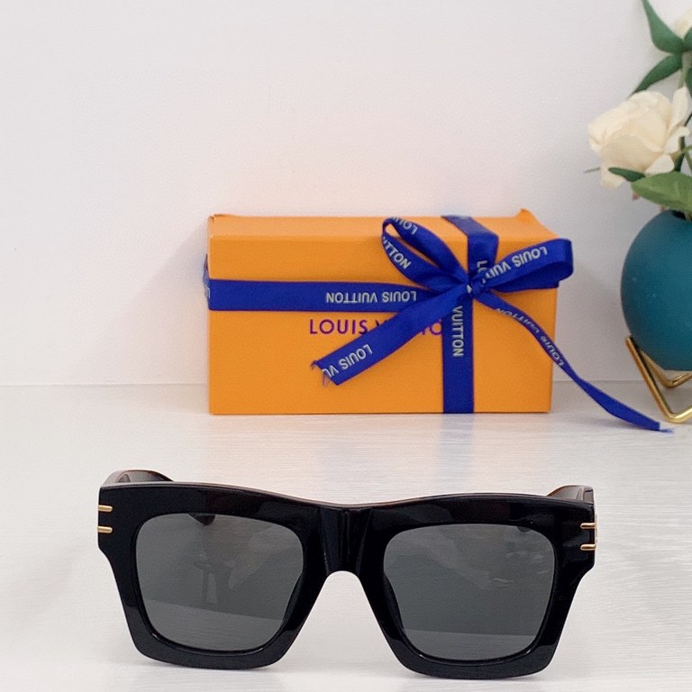 LV Blade Model No. 1482 Sunglasses are crafted in a timeless, rugged square design with articulation embellished with dazzling LV letters, Monogram florals at the headband and the LV Circle logo on the lenses. Highly rec