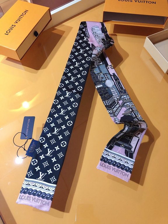 LV [AROUND THE WORLD] hair tie  PLV2141 ! Based on the work of renowned photographer Jacques Henri Lartigue, the Louis Vuitton hard case is featured alongside world-famous landmarks, highlighting the brand's travel herit