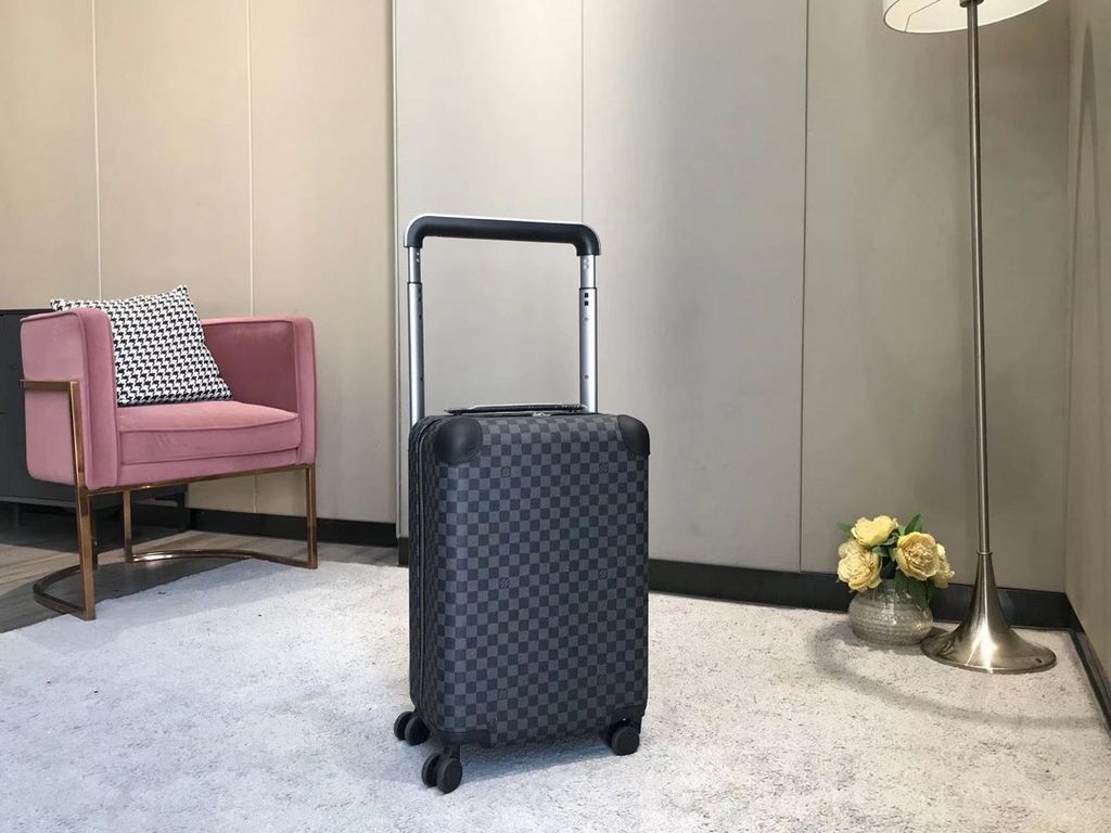 The new Horizon luggage revolutionizes Louis Vuitton's legendary heritage with a creative twist. The iconic Monogram canvas is embellished with travel appliqués that harken back to the brand's traditional luggage design.