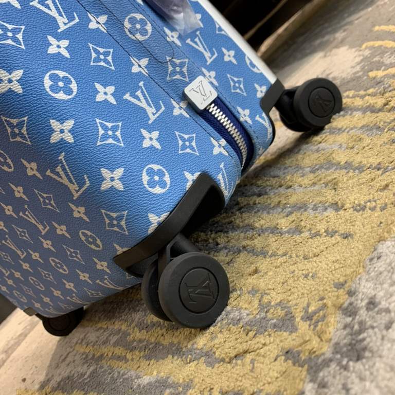 Virgil Abloh's Horizon 55 luggage for FallWinter 22 is a vision of clear skies, with the LV logo swirling across a Monogram canvas that resembles a clear sky, and a flexible design that includes a handle and dual wheels.