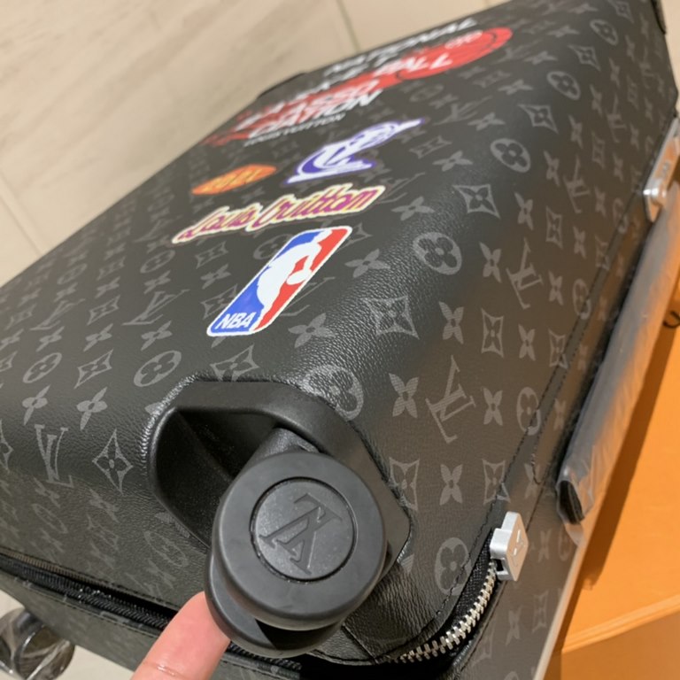 The LVxNBA SEASON 2 Capsule Collection Horizon 55 Quad Trolley Case takes the vibrant hue of the NBA Championship Jacket and embellishes it with appliqués and prints on Monogram-embossed leather, combining iconic element