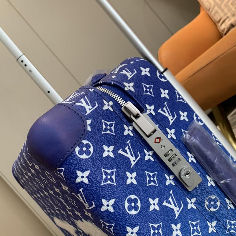 Virgil Abloh's Horizon 55 luggage for FallWinter 22 is a vision of clear skies, with the LV logo swirling across a Monogram canvas that resembles a clear sky, and a flexible design that includes a handle and dual wheels.