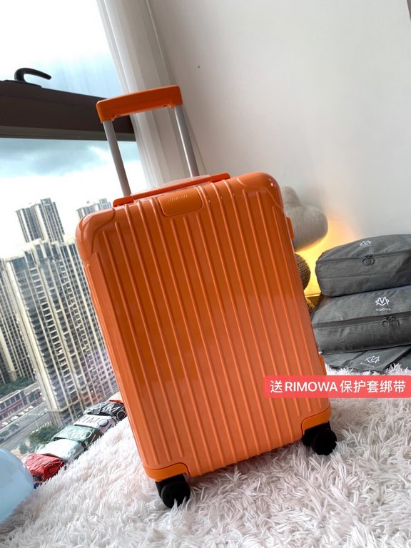 [Fragrant Mango Orange] RIMOWA Zhimowa new color suitcase, easy to use the same Essential series, colorful, enjoy the journey. Using the national universal TSA customs lock, upgraded version of the simple logo fashion hi