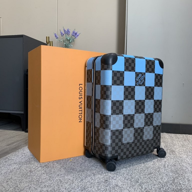 Tapping into the creative potential of the brand's classic Damier canvas, the new Horizon luggage features the Damier Graphite Giant pattern in varying shades of plaid in different sizes, with flexible dual wheels and a 