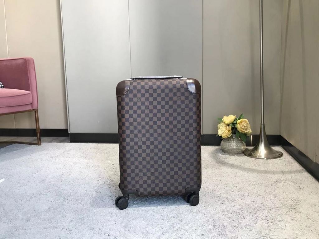 The new Horizon luggage revolutionizes Louis Vuitton's legendary heritage with a creative twist. The iconic Monogram canvas is embellished with travel appliqués that harken back to the brand's traditional luggage design.