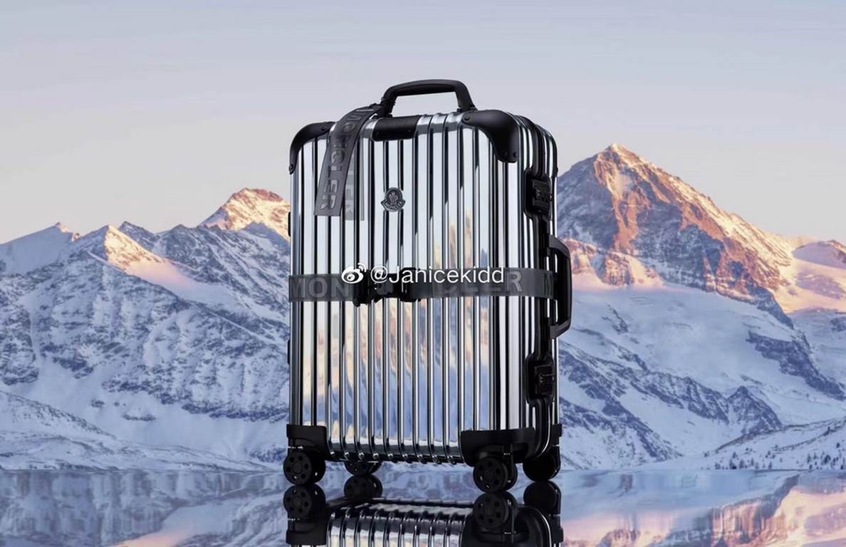 #RIMOWA# Mirror design - MONCLER RIMOWA REFLECTION themed co-branded luggage.Inspired by classic details such as the lacquered finish of a feathered MONCLER jacket and the reflective glaze of anti-glare mountaineering ge