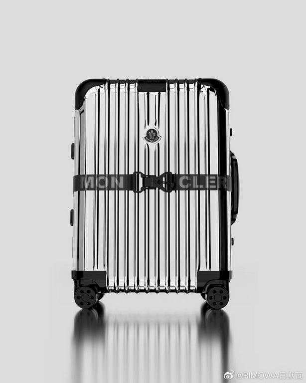 #RIMOWA# Mirror design - MONCLER RIMOWA REFLECTION themed co-branded luggage.Inspired by classic details such as the lacquered finish of a feathered MONCLER jacket and the reflective glaze of anti-glare mountaineering ge