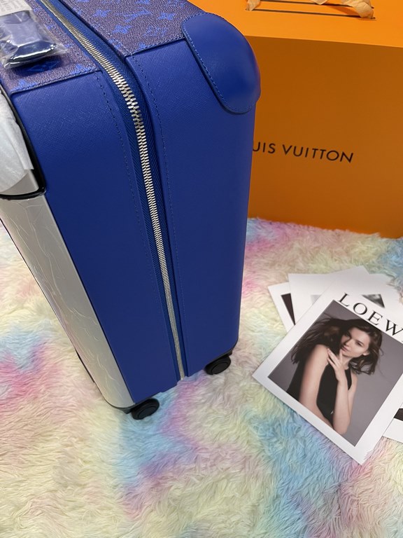 Industrial design icon Marc Newson presents the Horizon 55 four-wheeled luggage for Louis Vuitton SpringSummer 2019. Silver-colored metal pieces accent the Monogram canvas and Taga leather, while a large external trolley