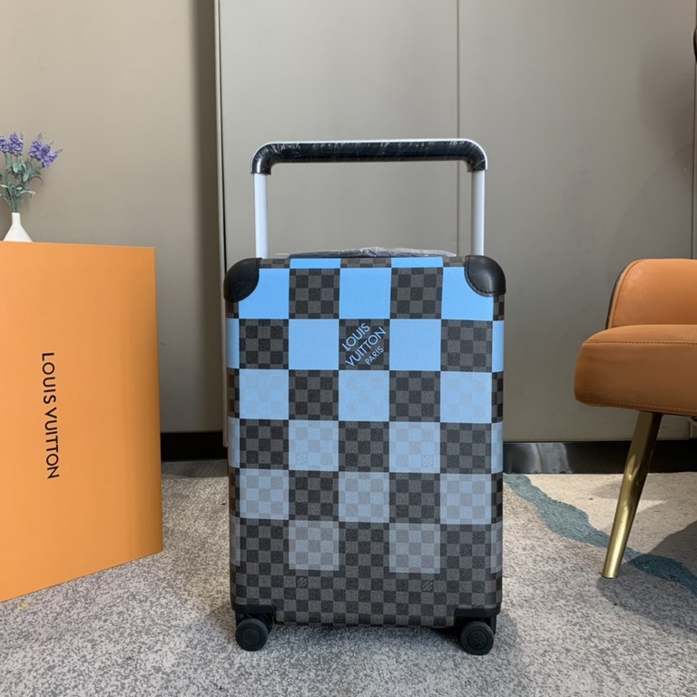 Tapping into the creative potential of the brand's classic Damier canvas, the new Horizon luggage features the Damier Graphite Giant pattern in varying shades of plaid in different sizes, with flexible dual wheels and a 