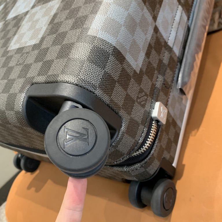 Tapping into the creative potential of the brand's classic Damier canvas, the new Horizon luggage features the Damier Graphite Giant pattern in varying shades of plaid in different sizes, with flexible dual wheels and a 