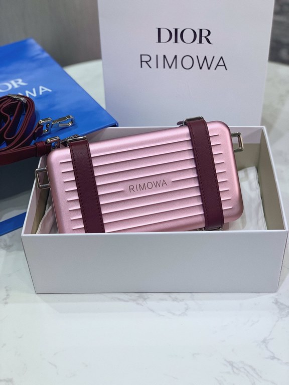 DIR X RIMOWA Capsule Collaboration CollectionUltra Limited EditionA lot of goodwill  My heart  Small but very  lovely. Super practical,Total  3 compartments. The size of a handbag.It can definitely fit an Iphone proMax [