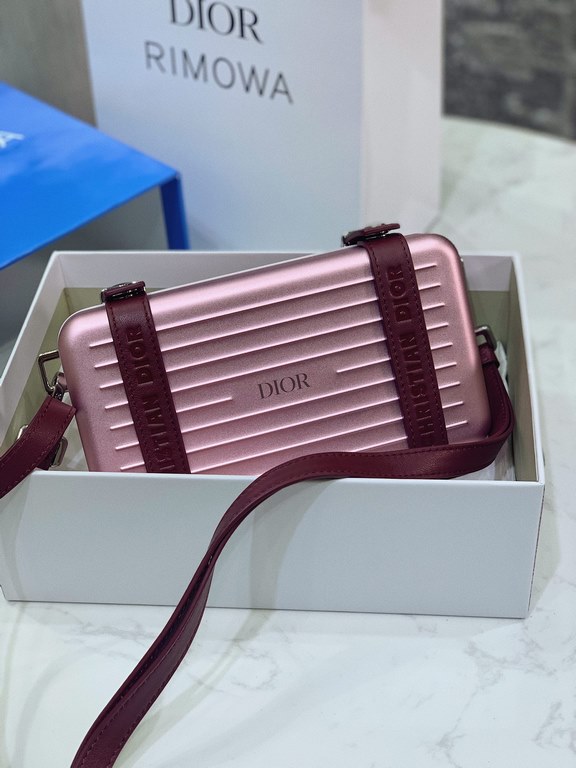 DIR X RIMOWA Capsule Collaboration CollectionUltra Limited EditionA lot of goodwill  My heart  Small but very  lovely. Super practical,Total  3 compartments. The size of a handbag.It can definitely fit an Iphone proMax [