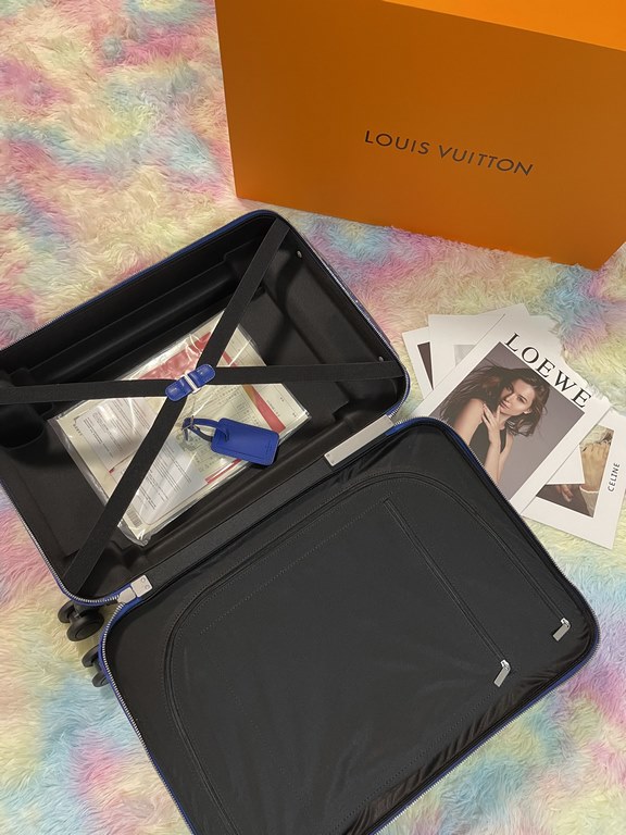 Industrial design icon Marc Newson presents the Horizon 55 four-wheeled luggage for Louis Vuitton SpringSummer 2019. Silver-colored metal pieces accent the Monogram canvas and Taga leather, while a large external trolley