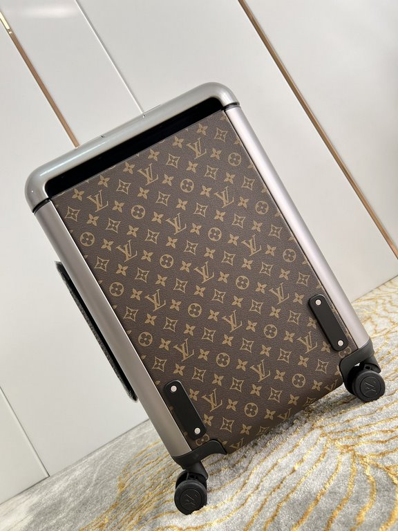 EXCLUSIVE PHOTO The new Horizon luggage revolutionizes Louis Vuitton's legendary heritage with a creative twist. The iconic Monogram canvas is embellished with travel appliqués that harken back to the brand's heritage of