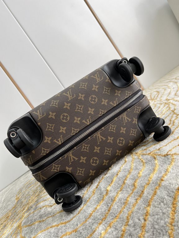 EXCLUSIVE PHOTO The new Horizon luggage revolutionizes Louis Vuitton's legendary heritage with a creative twist. The iconic Monogram canvas is embellished with travel appliqués that harken back to the brand's heritage of