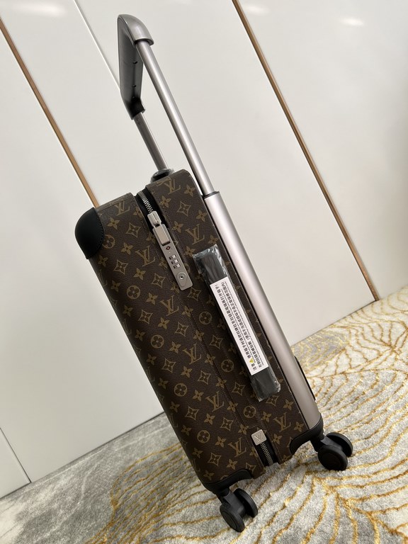 EXCLUSIVE PHOTO The new Horizon luggage revolutionizes Louis Vuitton's legendary heritage with a creative twist. The iconic Monogram canvas is embellished with travel appliqués that harken back to the brand's heritage of