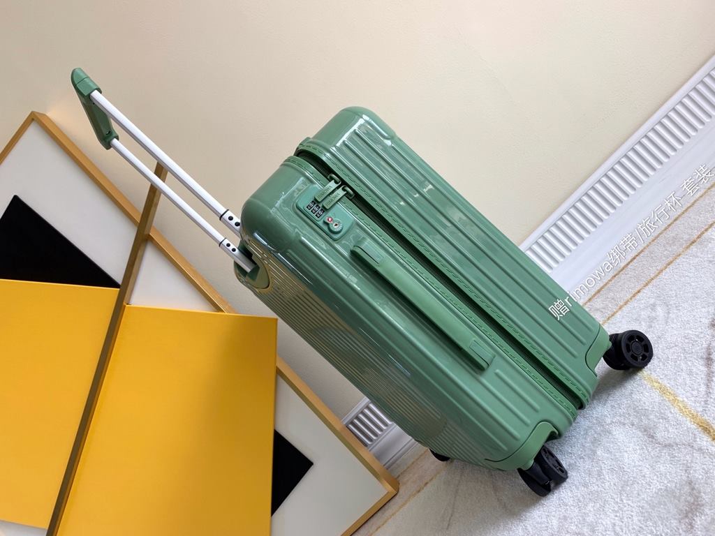 Rimowa Trolley caseluggageUltra-light pc zipper case, must get the same high value trolley case of YiYiChixi! Rimowa Essential new color collection! When you're young, you need to look good to travel!  Free Rimowa StrapM