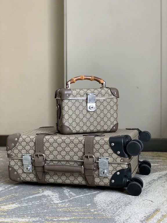 The make-up case with bamboo handles shown on the catwalk is a special piece created in collaboration with Globe-Trotter, a luxury travel brand founded in 1897 and known for its quintessential British style.Hide DetailsG