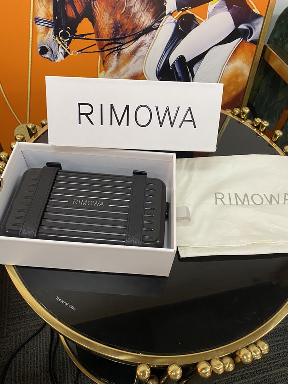 RIMOWA #Crossbody Clutch Bag Collectionpersonal series is proud to present vertical crossbody bag, it's small details are really great, the exterior is made of polycarbonate and luggageessential colors complement each ot