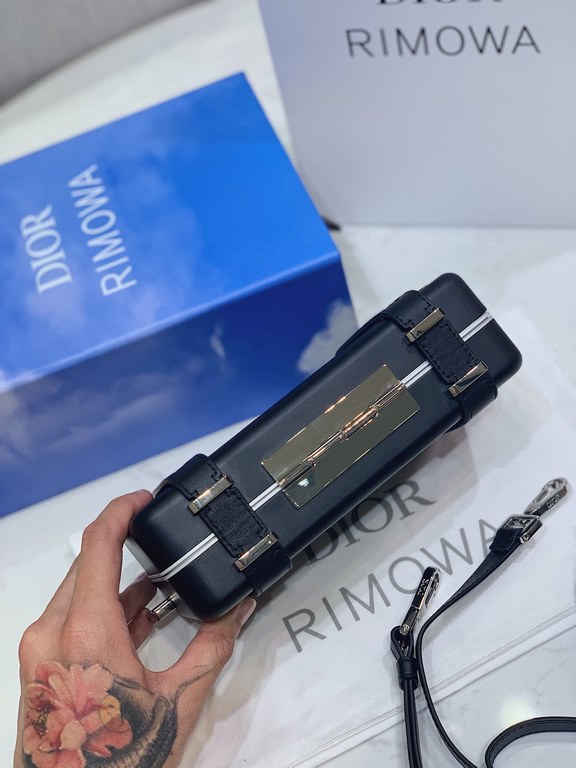 DIR X RIMOWA Capsule Collaboration CollectionUltra Limited EditionA lot of goodwill  My heart  Small but very  lovely. Super practical,Total  3 compartments. The size of a handbag.It can definitely fit an Iphone proMax [