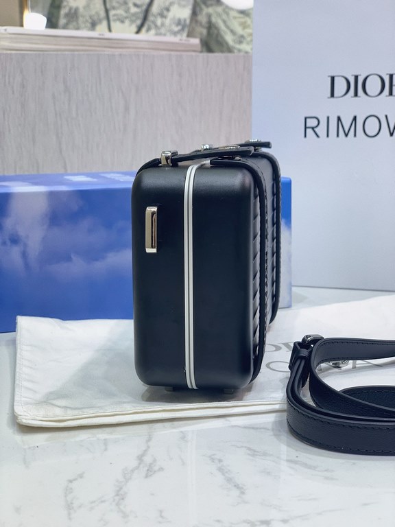 DIR X RIMOWA Capsule Collaboration CollectionUltra Limited EditionA lot of goodwill  My heart  Small but very  lovely. Super practical,Total  3 compartments. The size of a handbag.It can definitely fit an Iphone proMax [