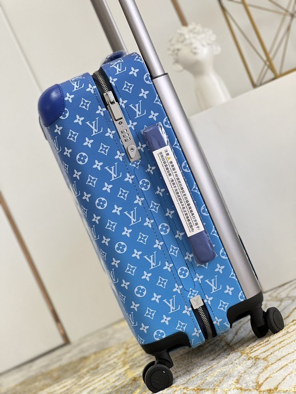 The new Horizon luggage revolutionizes Louis Vuitton's legacy with a creative twist. The iconic Monogram canvas is embellished with travel appliqués that harken back to the brand's heritage of luggage design. Leather cor