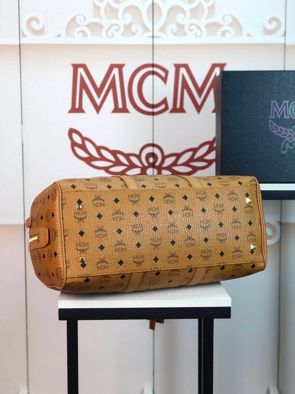 Code 6022 MCM Traveler Visetos Weekend Travel BagCrafted from durable Visetos printed   coated canvas and bonded lining for reduced weight, the Visetos Weekend   Traveler Bag is one of our top lightweight textures. This 