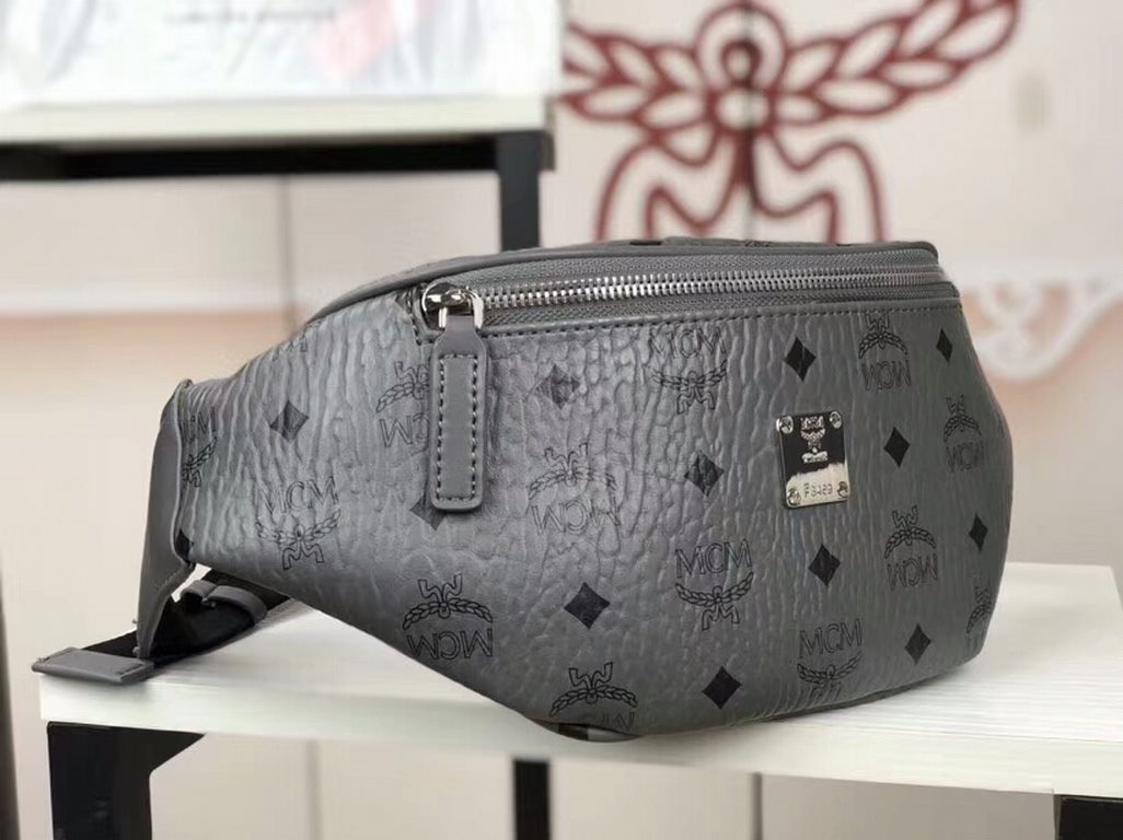 Code 1039New Release - MCM Stark Visetos Belt BagCrafted from coated canvas with an iconic classic print. Inject chic style into your look with this functional Stark fanny pack. The durable, adjustable logo fabric should