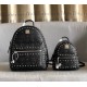 Code 5917-5718-5919. [MCM] Stark Visetos studded duffel bag in a classic Visetos print with metal rivets outlining the print. Crafted from lightweight bond-coated canvas and designed in a classic Visetos print, the pract