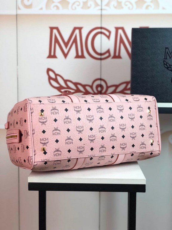 Code 6022 MCM Traveler Visetos Weekend Travel BagCrafted from durable Visetos printed   coated canvas and bonded lining for reduced weight, the Visetos Weekend   Traveler Bag is one of our top lightweight textures. This 