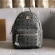 Code 5918 mini figure [MCM] Stark Visetos studded duffel bag in a classic Visetos print with metal studs outlining the print. Crafted from lightweight bond-coated canvas and designed in a classic Visetos print, the pract