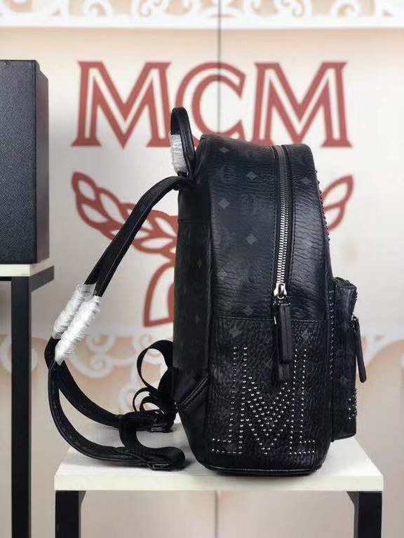 Code 5927  small and medium size figure[Rose] MCM [Rose] Gunta M Studded Backpack Bold style without losing detail  Unique features adorned with bright metal studs, featuring interior laptop compartment, side exterior po