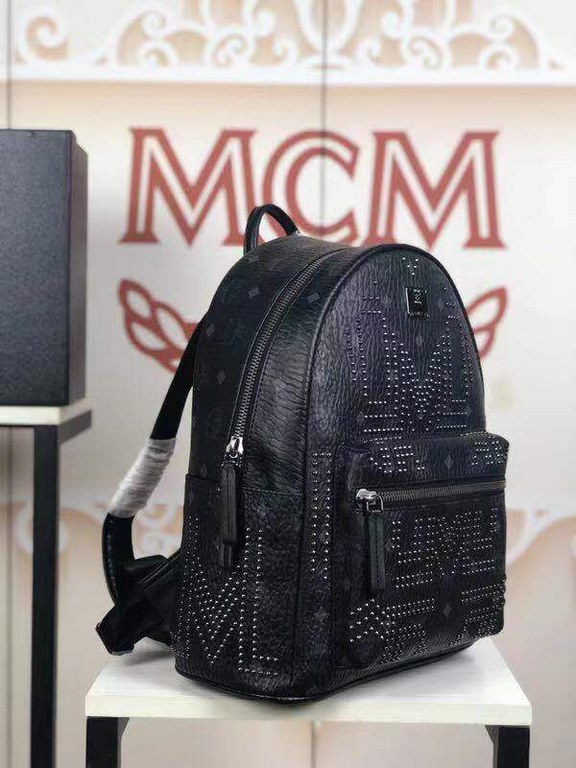 Code 5927  small and medium size figure[Rose] MCM [Rose] Gunta M Studded Backpack Bold style without losing detail  Unique features adorned with bright metal studs, featuring interior laptop compartment, side exterior po