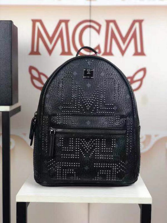 Code 5927  small and medium size figure[Rose] MCM [Rose] Gunta M Studded Backpack Bold style without losing detail  Unique features adorned with bright metal studs, featuring interior laptop compartment, side exterior po