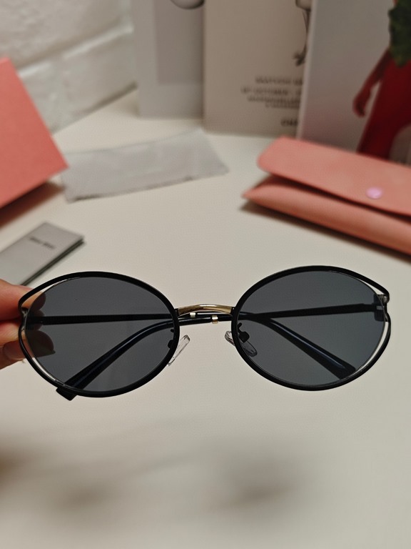 MIUMIU Miu Miu retro oval sunglasses fashion UV sunshade Korean glasses high quality tide