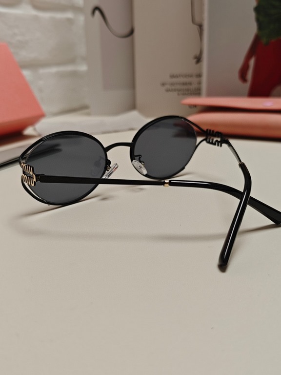 MIUMIU Miu Miu retro oval sunglasses fashion UV sunshade Korean glasses high quality tide