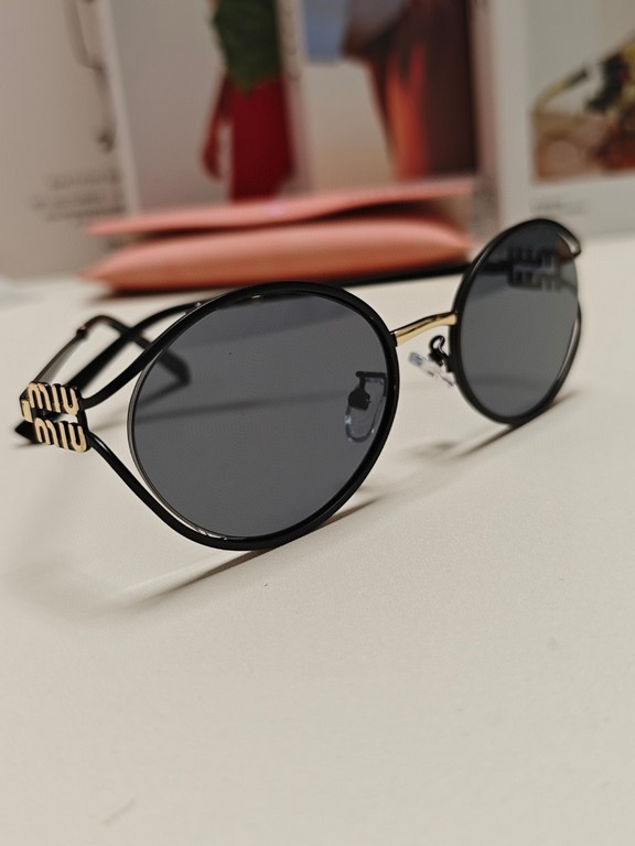 MIUMIU Miu Miu retro oval sunglasses fashion UV sunshade Korean glasses high quality tide